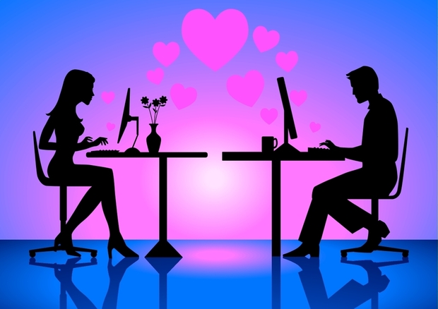 cartoon silhouttes of a man and a woman sitting at desks facing each other, on their computers surrounded by hearts